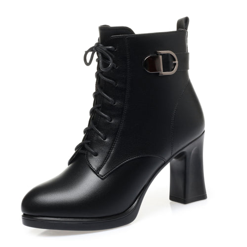 Women's black lace-up ankle boots with buckle accent, side profile