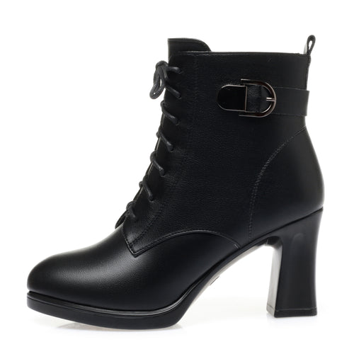 Women's black lace-up ankle boots with buckle accent, side view